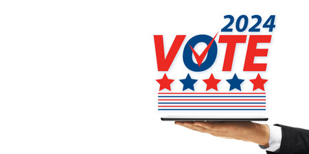 A hand holding a Vote 2024 sign with stars and stripes on a white background, emphasizing the...