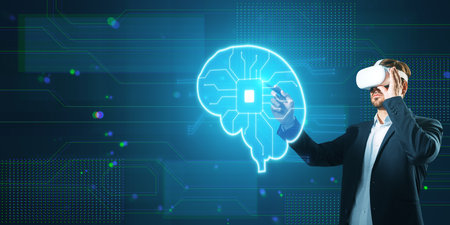 Attractive young businessman with vr glasses and glowing blue circuit digital brain hologram on...