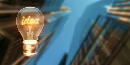 Creative glowing lamp on blurry city background with mock up place. Idea, energy, inspiration and...