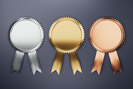 Creative golden, copper and silver awards with ribbons on gray background. Mock up place. 3D Renderingの写真素材