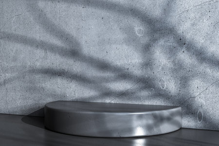 A grey half-round podium stands against a concrete wall with abstract shadows. Minimalist design, empty space, modern presentation background. 3D Rendering.の写真素材