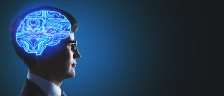 Side profile of a man with a glowing blue circuit brain, representing technology and AI integration....