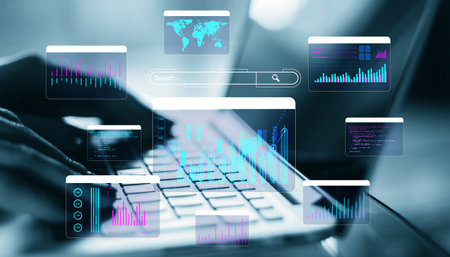 Digital graphs and data overlays displayed above a keyboard, set in a business technology background...