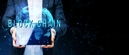A person holding a holographic globe displaying BLOCKCHAIN text, with a digital network background....