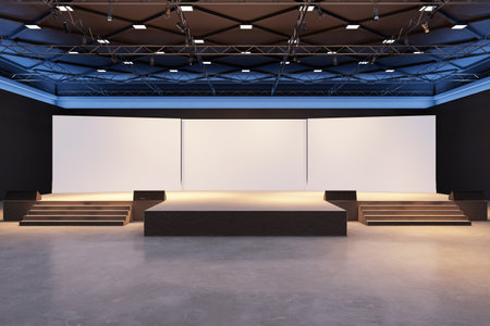Empty stage with blank white screens, illuminated by spotlights in a dark contemporary exhibition...