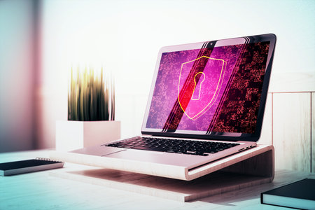 Laptop with glowing shield and lock icon on display, wooden desk, plant and notebook, light...