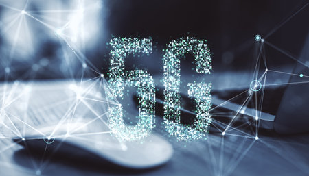 5G technology sign formed with digital particles over a modern workspace, holographic connections on a blurry background, concept of connectivityの写真素材