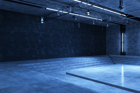 Industrial-style empty room with concrete surfaces, steps, and ceiling lights, set against a dark background. Concept of modern exhibitions. 3D Rendering.の写真素材