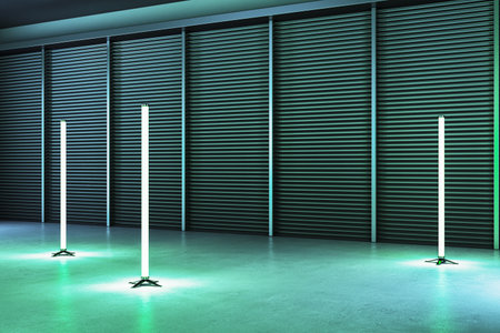 Vertical neon lights in a modern interior with a concrete floor and metal wall backdrop. Minimalist...