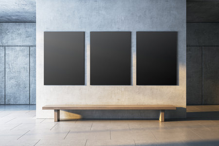 Minimalist gallery setting with blank black frames on a textured concrete wall, wooden bench below, modern interior, concept of clean design. 3D Rendering.の写真素材