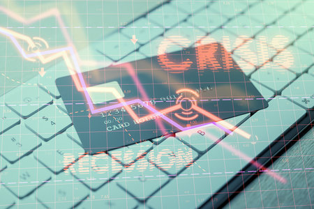Credit card on keyboard, holographic style, grid background. Concept of financial crisis and recessionの写真素材