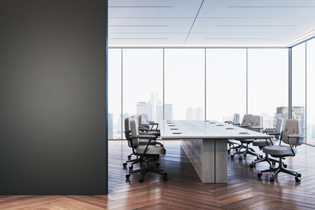 Spacious corporate boardroom with sleek furniture, large desk, ergonomic chairs, and panoramic cityscape through glass walls. 3D Renderingの写真素材