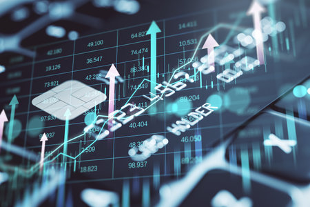 Credit chip and upward arrows on abstract light background with financial graphs and blur keyboard,...