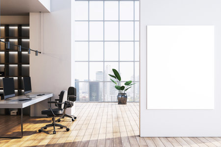 Empty modern office room with vertical blank canvas on white wall, wood floor, glass windows, and city view in corporate workspace. 3D Renderingの写真素材