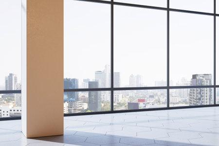 Bright modern room interior with tall windows overlooking city skyline, light reflections on hexagonal tile floor, minimalist background concept, 3D Renderingの写真素材