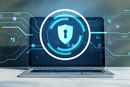 Laptop with digital lock icon on screen, futuristic graphic style, glowing circuit lines on background. Concept of cybersecurity. 3D Renderingの写真素材