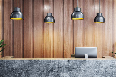 Reception desk with computer on marble counter, modern graphic style, wooden panel wall background, concept of office workspace interior. 3D Renderingの写真素材