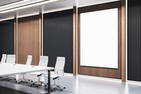Modern conference room with white chairs, large table, and vertical blank canvas on dark wooden paneled wall. 3D Renderingの写真素材