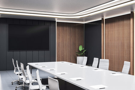 Modern boardroom interior with sleek furniture, wood panel walls, ceiling lights, large table and screen. Concept of corporate workspace. 3D Renderingの写真素材