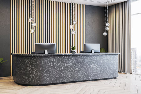 Reception desk in luxury business office with stone counter, vertical wood wall, hanging lights, and city view through large window. 3D Renderingの写真素材