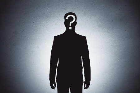 Silhouette of a person with a question mark on the face, abstract lighting and dark background, concept of curiosity, identity, or problemの写真素材