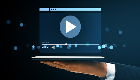 Streaming video interface above tablet in human hand, modern digital style, glowing dark background, concept of online content and displayの写真素材