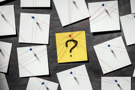 Sticky notes and red strings pinned to dark wall background with central yellow note showing question mark symbolizing detective investigation concept. 3D Renderingの写真素材