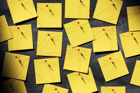 Yellow sticky notes pinned with red threads on dark chalkboard wall background, symbolizing detective investigation or business workflow concept. 3D Renderingの写真素材
