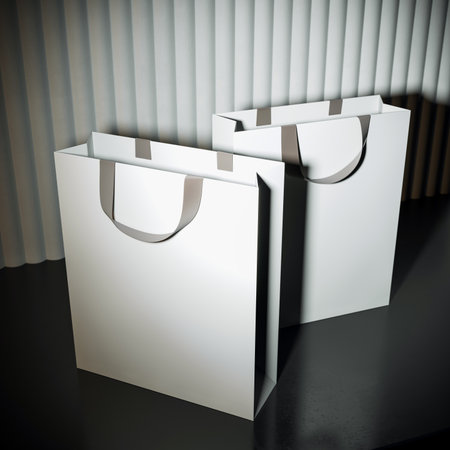 Two blank shopping bags with handles in modern mockup style on dark floor and curtain background. Concept for branding, advertising, and retail. 3D Renderingの写真素材