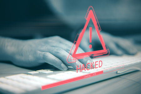 Hands typing on a keyboard with a red warning exclamation symbol and HACKED text overlay, digital style on a dark virtual backgroundの写真素材