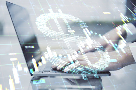 Person typing on laptop with dollar symbol and forex charts overlaid, modern light background, concept of finance, economy, and investmentの写真素材