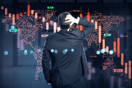 Rear view of businessman watching falling stock market graph, digital style, on dark abstract background, concept of financial crashの写真素材