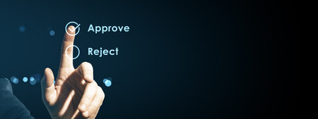 Hand pressing digital approve button on futuristic dark background with glowing interface,...