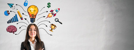 Confident businesswoman with lightbulb and creative concept doodles above her head on a clean gray wall background, symbolizing innovation and ideasの写真素材