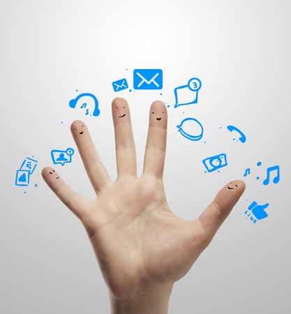 Happy group of finger smileys with social chat sign and speech bubbles,icons  Fingers representing a social network の写真素材