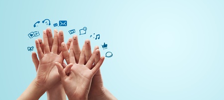 Happy group of finger smileys with social chat sign and speech bubbles,icons  Fingers representing a social network の写真素材