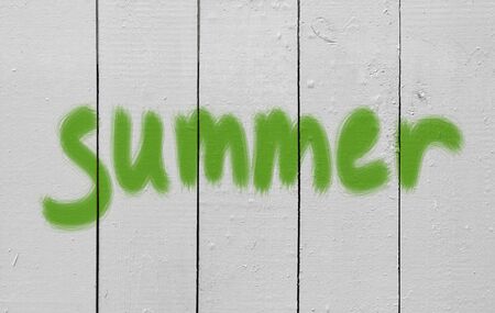 green label summer on wooden wallの写真素材