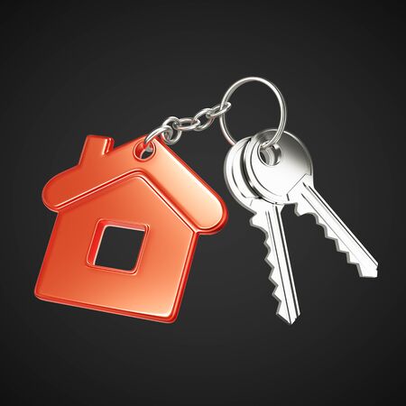 key with  red key chain in form of houseの写真素材