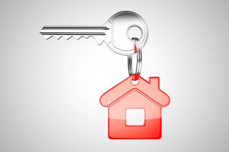 key with red key chain in form of homeの写真素材