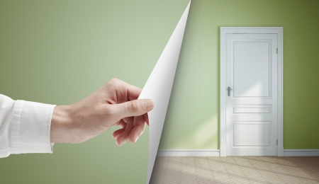 hand turns green page in roomの写真素材