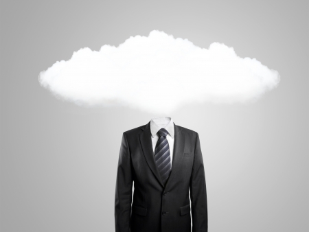 man with cloud instead of head  on gray backgroundの写真素材