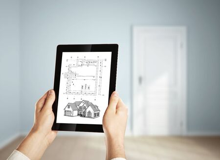 House Plan on  digital tablet in  roomの写真素材