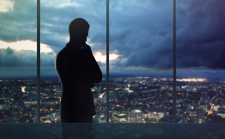 businessman thought and city nightlifeの写真素材