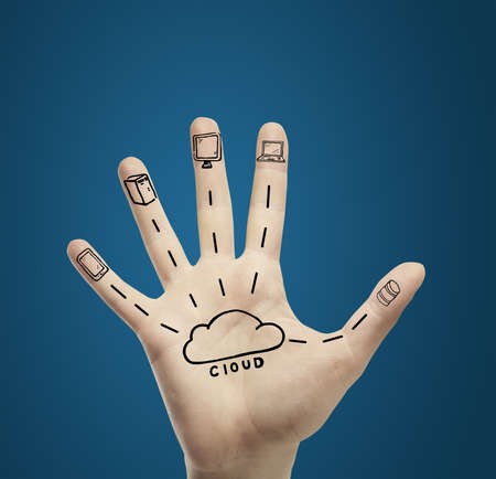 cloud computing on hand on a blue backgroundの写真素材