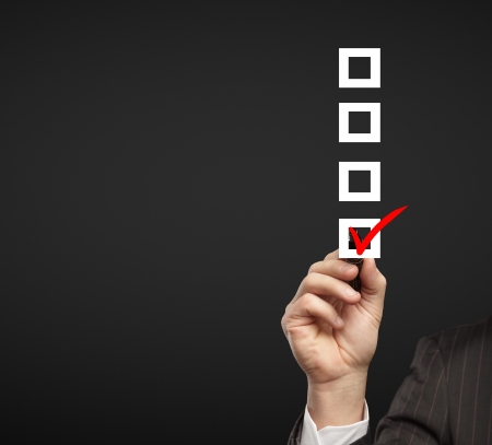 hand drawing check box on a black backgroundの写真素材