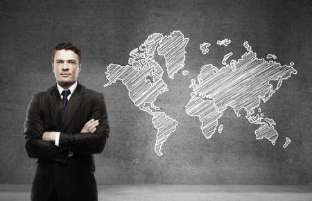 businessman and drawing map on wallの写真素材