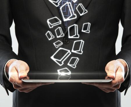 digital tablet in hand and folder iconの写真素材