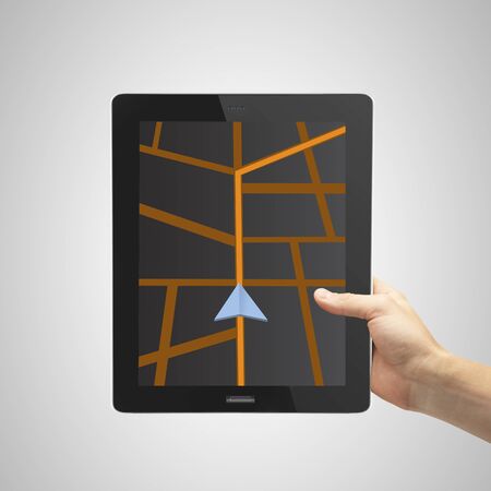 hand holding tablet with drawing mapの写真素材
