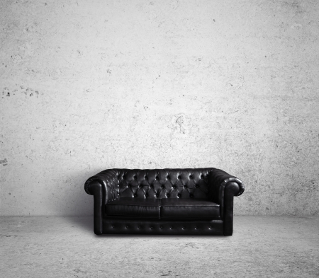 leather sofa in concrete roomの写真素材