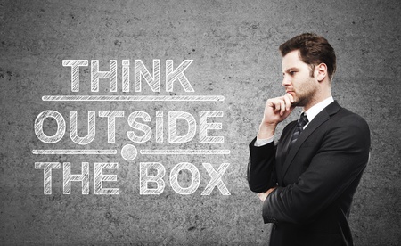 businessman thinking and think outside the boxの写真素材